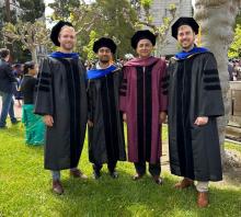Photograph of Thermal Energy Group graduates Dr. Drew Lilley, Dr. Divya Chalise, and Dr. Nate Weger at their commencement with their advisor, Dr. Ravi Prasher.